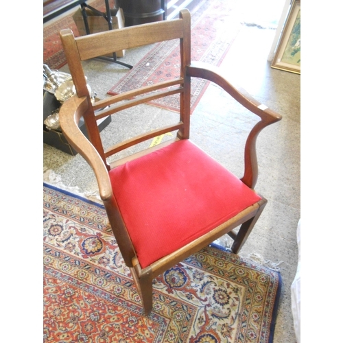 51 - An oak carver chair with ladder back, rush seat and turned legs, two blue painted chairs with rush s... 