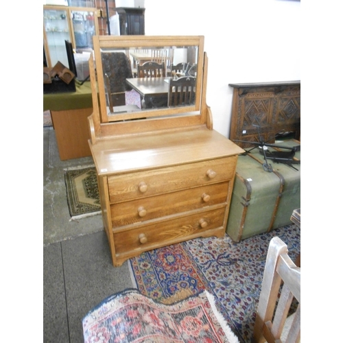 73 - An oak dressing table fitted swing mirror above three wide drawers with turned wood knob handles - 3... 