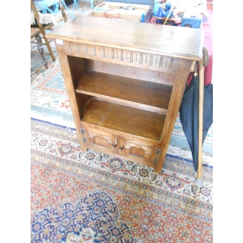 77 - An oak openfront bookcase fitted four shelves, on splayed legs - 32 1/2in. wide and a reproduction o... 