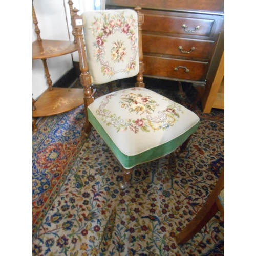 78 - A Victorian oak framed nursing chair with floral tapestry seat and back, fluted supports and legs, o... 