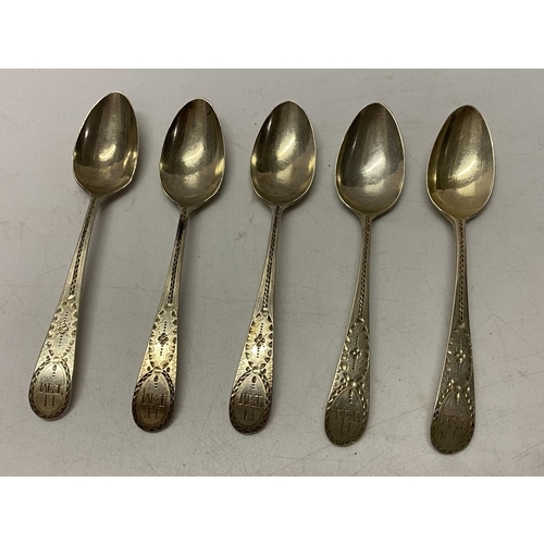 163 - A set of five Georgian silver teaspoons with engraved decoration - London 1794