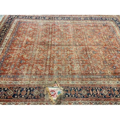 1 - A large Feraghan carpet (damaged)