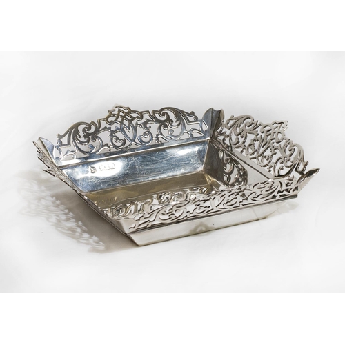 128 - A square silver bon bon dish with saw pierced border - London 1908, makers marks for R Hodd & Son