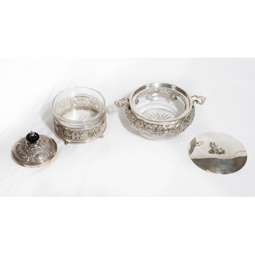 129 - A Victorian glass preserve dish with silver lid and saw pierced silver collar and rim, fitted twin s... 