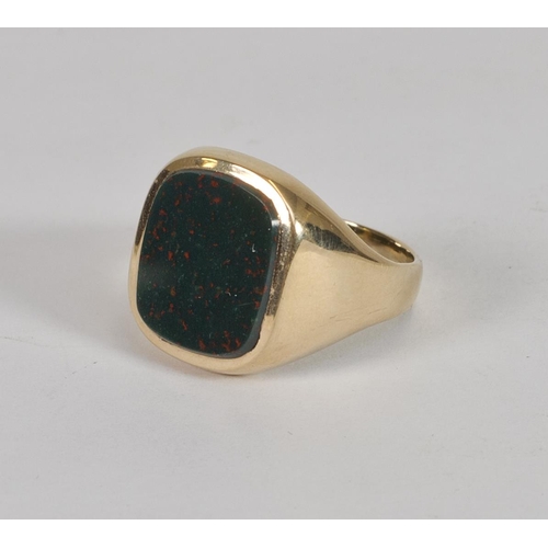 166 - A gentleman's signet ring set bloodstone, on a 9ct. gold shank