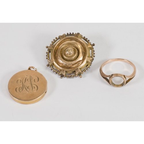 167 - A 9ct. gold circular locket, a gold coloured metal brooch and a rose gold coloured metal ring shank