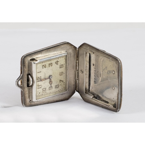 189 - A travelling watch retailed by E Gubelin Lucerne, in an Eterna Company sterling silver and leather c... 