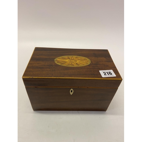 216 - A Georgian mahogany tea caddy with boxwood stringing, paterae to the lid, the interior fitted two co... 