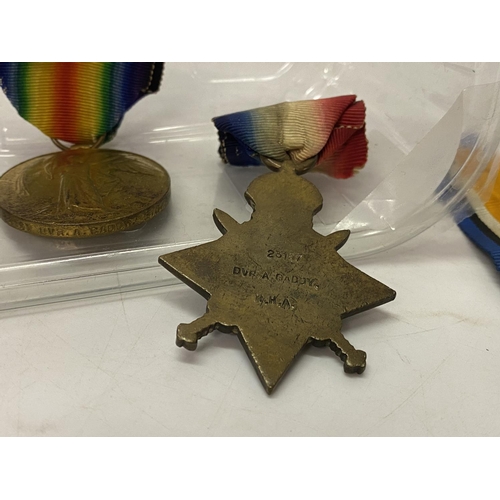 244 - A set of three First World War medals including 1914 Star awarded to 23157 Dvr A Caddy R.H.A