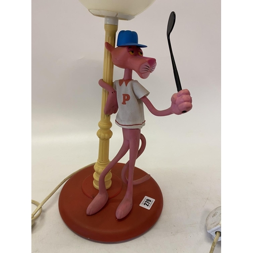 279 - An Italian tablelamp base in the form of The Pink Panther with a golf club, leaning against a lamp p... 