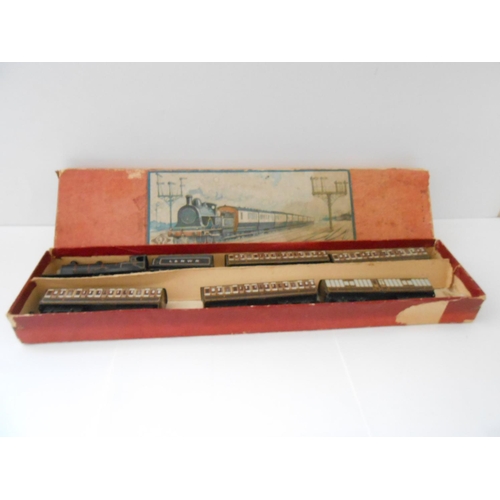 350 - A miniature tin plate railway in fitted box