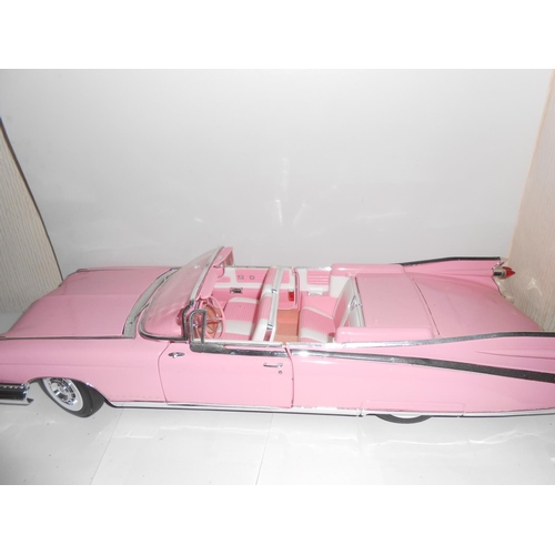 365 - A modern toy pink Cadillac Eldorado, boxed - 18 1/2in. long