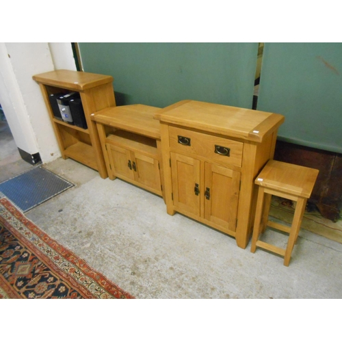 40 - A modern light oak side cabinet fitted two drawers, a matching bookcase fitted shelves, a matching t... 