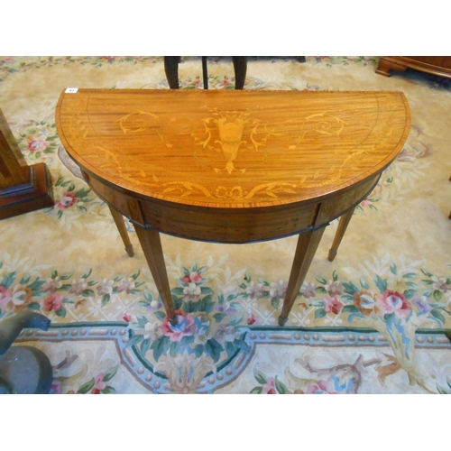 61 - An Edwardian satinwood and inlaid card table with half round folding top, harebell and swag decorati... 