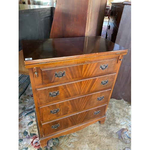 74 - A reproduction mahogany bachelors chest with folding top, fitted four drawers, on bracket feet - 25i... 