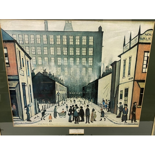 8 - A coloured print after Lowry entitled Street Scene, mounted, framed and glazed - 16 1/2in. x 21 1/2i... 