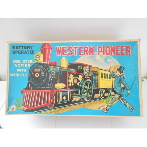 373 - A Japanese Modern Toys battery operated Eastern Pioneer, boxed and a Hooting Locomotive, boxed - bot... 