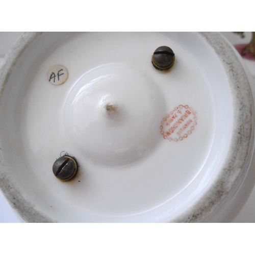 395 - Four French pottery inkwells in the form of revolving shells