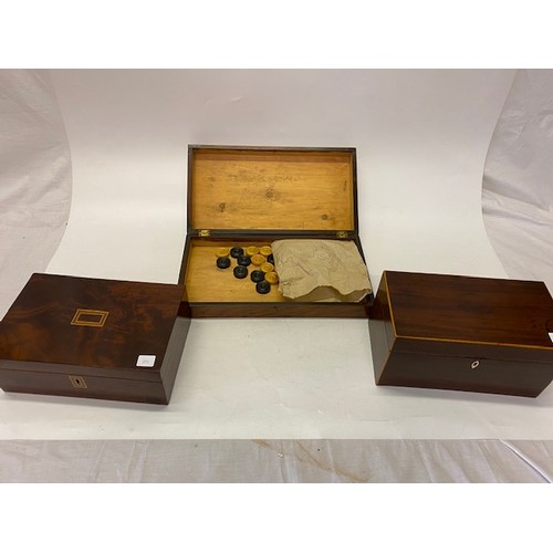 221 - A walnut games box with chessboard top, the interior fitted with draughts and chess pieces - 15 1/4i... 