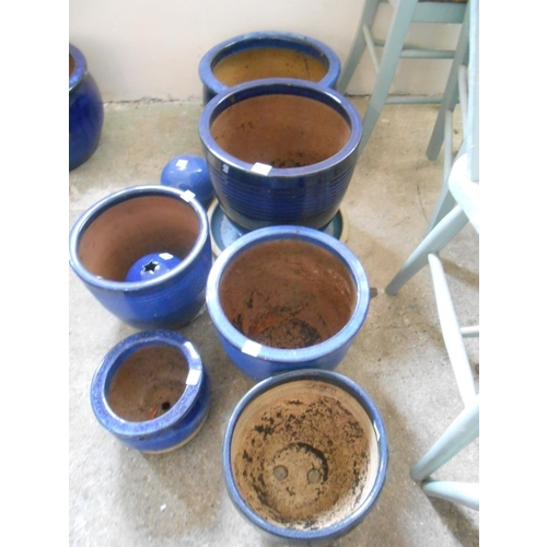 46 - A selection of blue glazed pottery garden pots