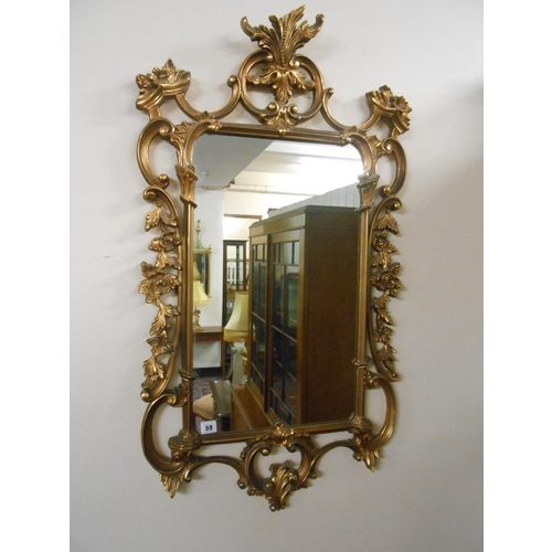 59 - A rectangular wall mirror in a gilt style leaf scroll frame and a wall mirror in a pewter frame - 35... 