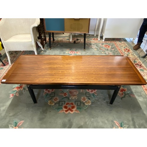 62 - A 1970's teak finished coffee table