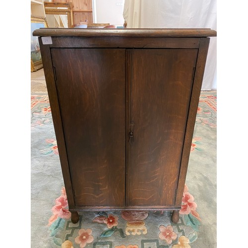 29 - A walnut beside cabinet fitted panelled door, on short cabriole legs - 16in. wide, a 19th Century ma... 