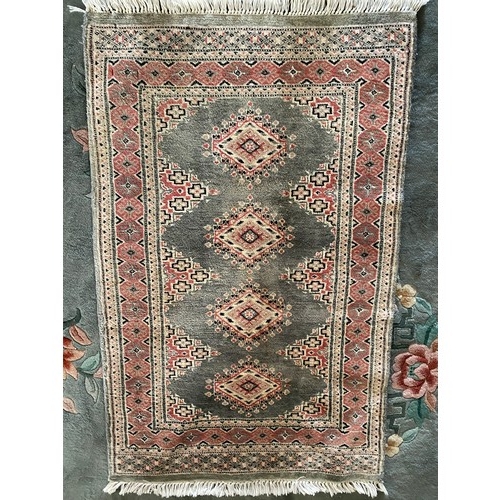 2 - A Bokhara style rug, beige field with black stylised decoration, fringed - 72in. x 48in. and a small... 