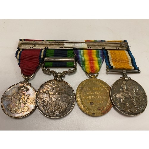 211 - A group of four medals awarded to 2.Lieut J.H Spencer comprising:- British War medal, Victory medal,... 