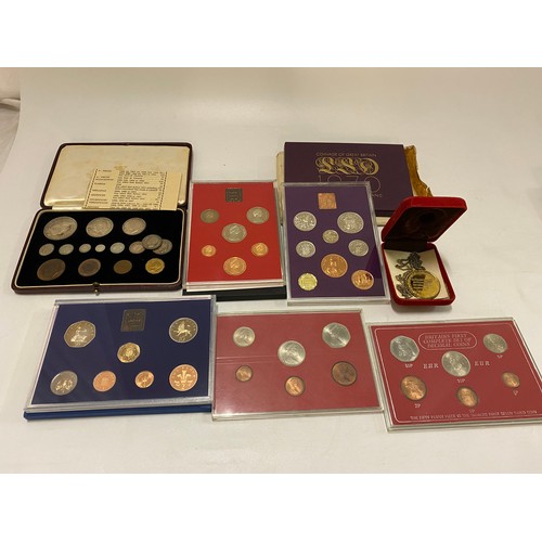 252 - A set of George VI specimen coins 1937, in leather box, five sets of British decimal coins and a gol... 