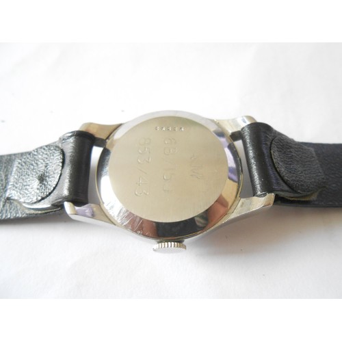 203 - A gentleman's Le Coultre wristwatch in a stainless steel case, on black leather strap