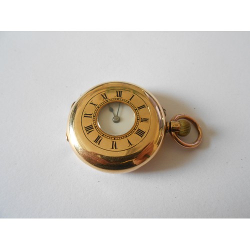 213 - A lady's fob watch retailed by J Sewill, 30 Cornhill, London, white enamel dial, in an 18ct. gold hu... 