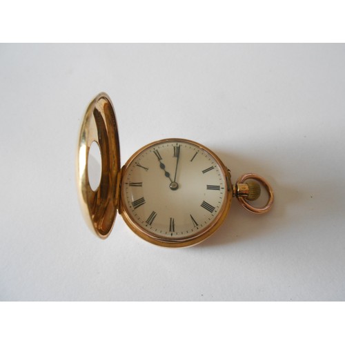 213 - A lady's fob watch retailed by J Sewill, 30 Cornhill, London, white enamel dial, in an 18ct. gold hu... 