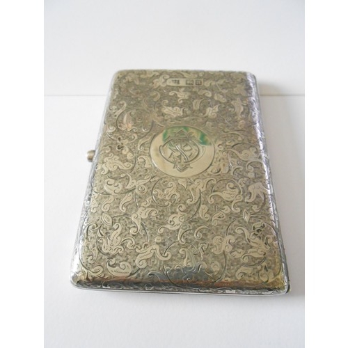 180 - A Victorian silver cigarette case with all over engraved decoration of flowers and leaves - London 1... 