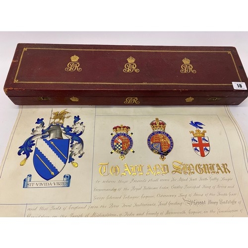 18 - A Grant Of Arms with two brass coloured seals, in a red and gilt tooled leather box