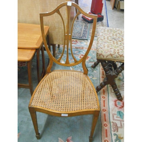 105 - Two Sheraton design chairs with inlaid frames, cane seats, on spade feet, an Edwardian walnut occasi... 