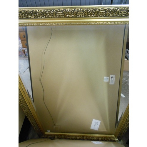 64 - A rectangular bevelled wall mirror in a gilt frame, a ditto in a black frame, two other mirrors and ... 