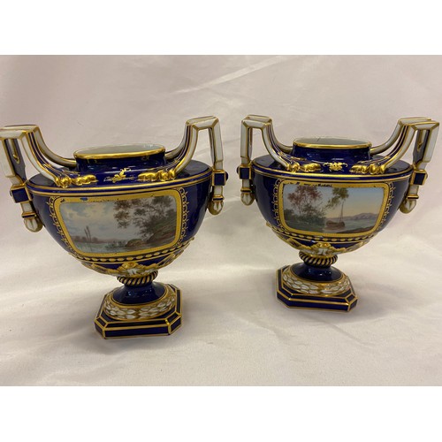 163 - A pair of 19th Century French porcelain vases, deep blue ground, pierced covers with bud finials, fi... 