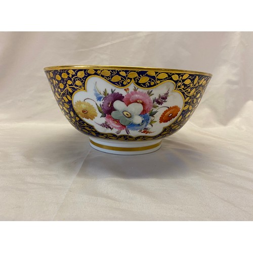 165 - A 19th Century English porcelain bowl, deep blue ground and gilded painted with flowers and leaves i... 