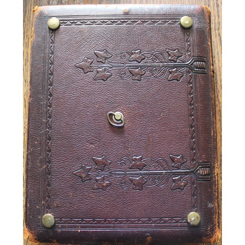 39 - Two Victorian photograph albums. One containing 130 carte-de-visite and cabinet cards (binding broke... 