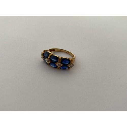 295 - A lady's ring set six oval sapphires and diamond spacers, on a 9ct. gold shank and a lady's ring set... 