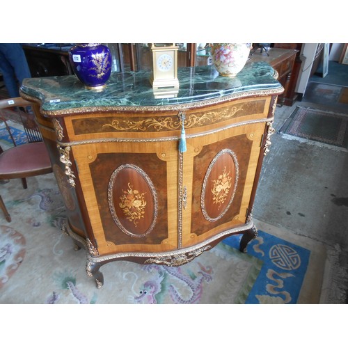 90 - A reproduction French style cabinet with green marble top, serpentine front fitted frieze drawer abo... 