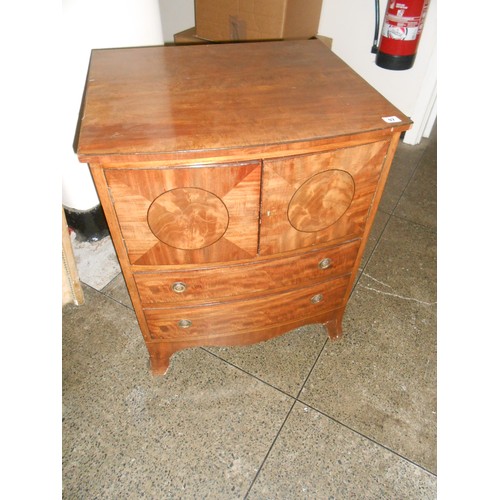 92 - A Georgian mahogany and ebony line inlaid commode, the upper part fitted two doors, two wide drawers... 