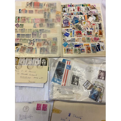 34 - A stamp album and a quantity of loose stamps