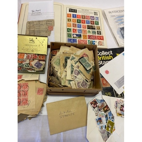 34 - A stamp album and a quantity of loose stamps