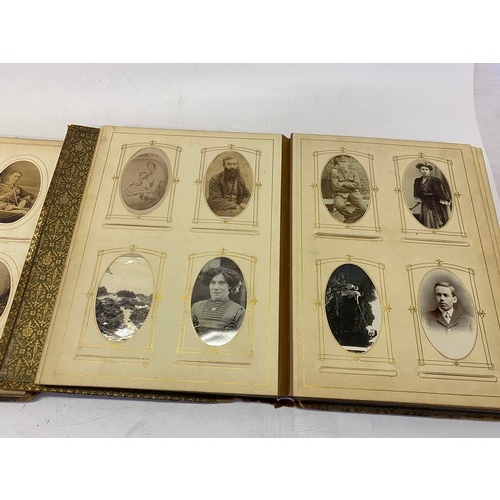 39 - Two Victorian photograph albums. One containing 130 carte-de-visite and cabinet cards (binding broke... 