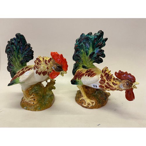 129 - A pair of Continental pottery models of cockerels - 13in.  high