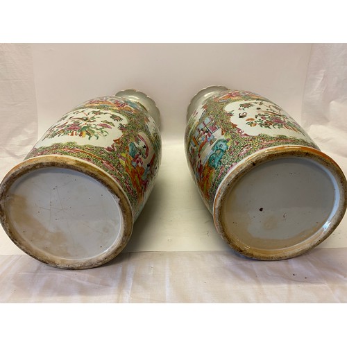 180 - A pair of 19th Century Cantonese vases with applied gilded lizards to the necks, decorated all round... 