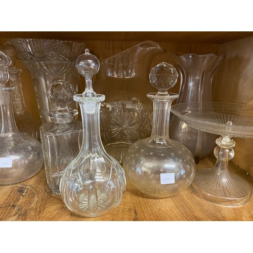 196 - A quantity of glass including decanters, wines, vases etc..