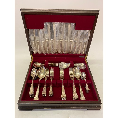 227 - Two mahogany canteens containing silver plated flatware